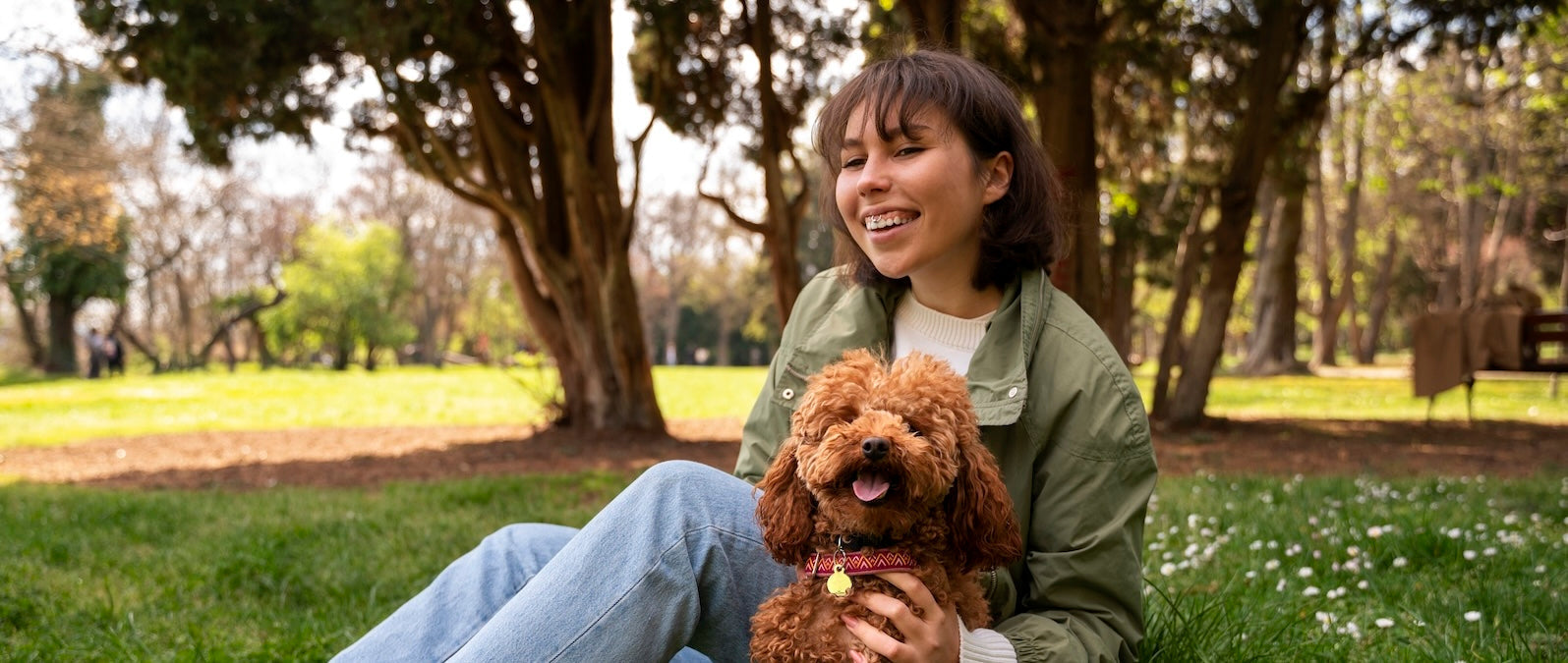 Adorable pet parent with her dog