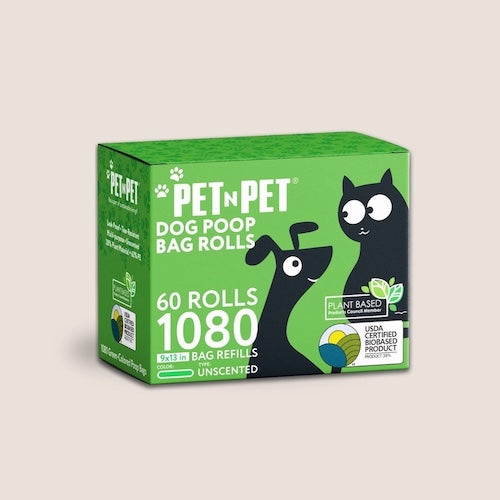 Pet N Pet dog poop bag rolls, 60 rolls (1080 bags) in a green box featuring a cartoon dog and cat. Bags are 9x13 inches, unscented, and made with 38% USDA Certified Biobased materials. Displayed on a bright green background.