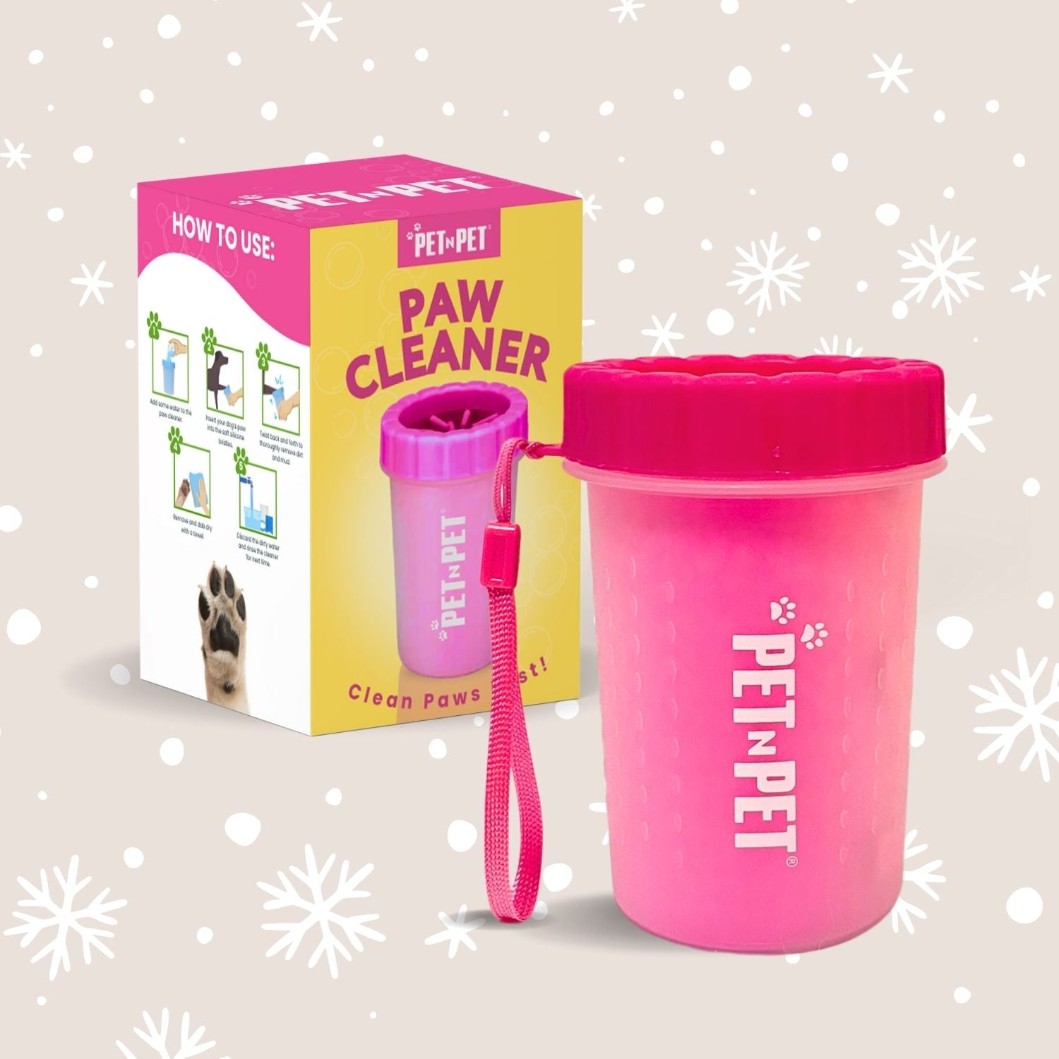 Pink paw cleaner with packaging on a light background