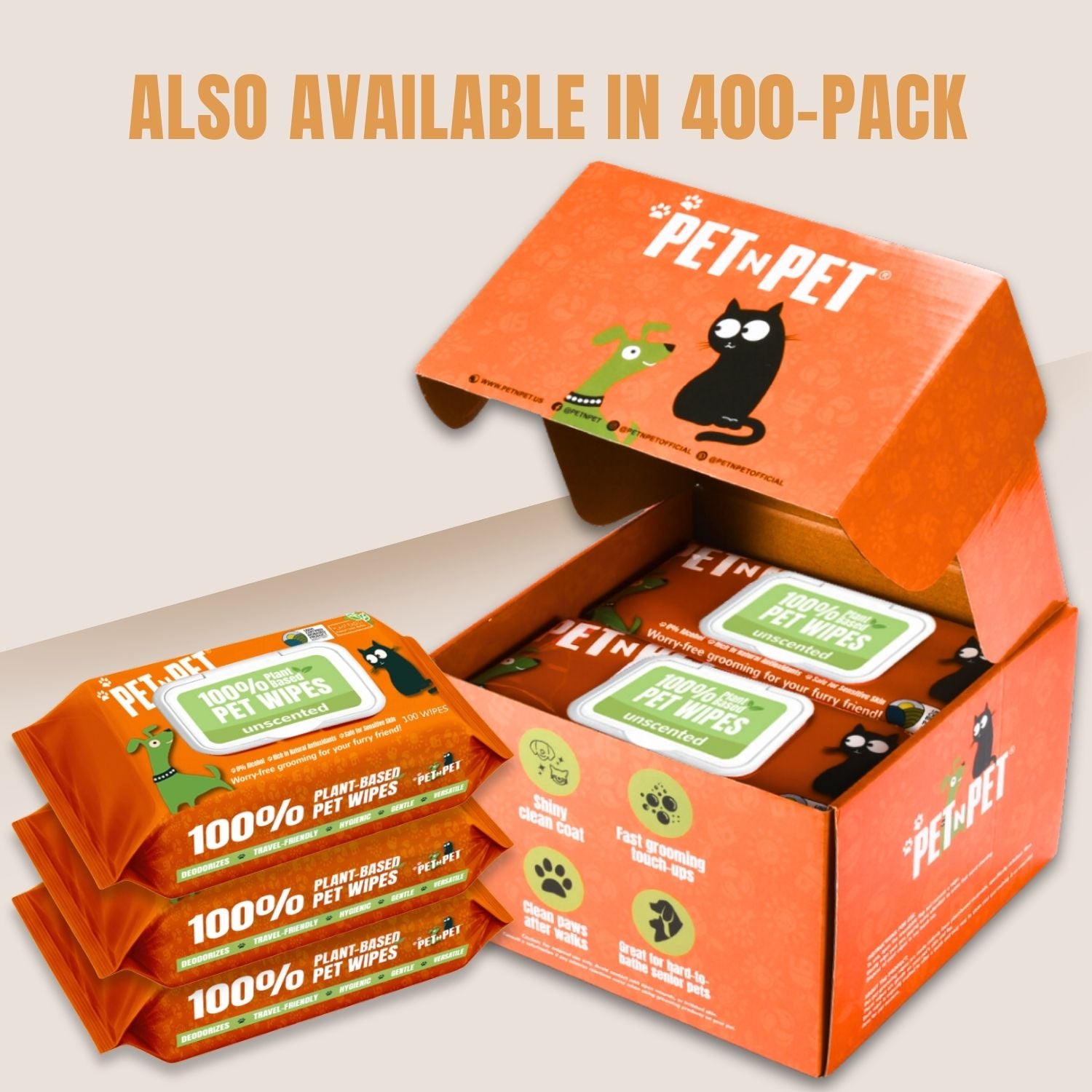 Open box of Pet n Pet wipes with additional packs stacked on a light background