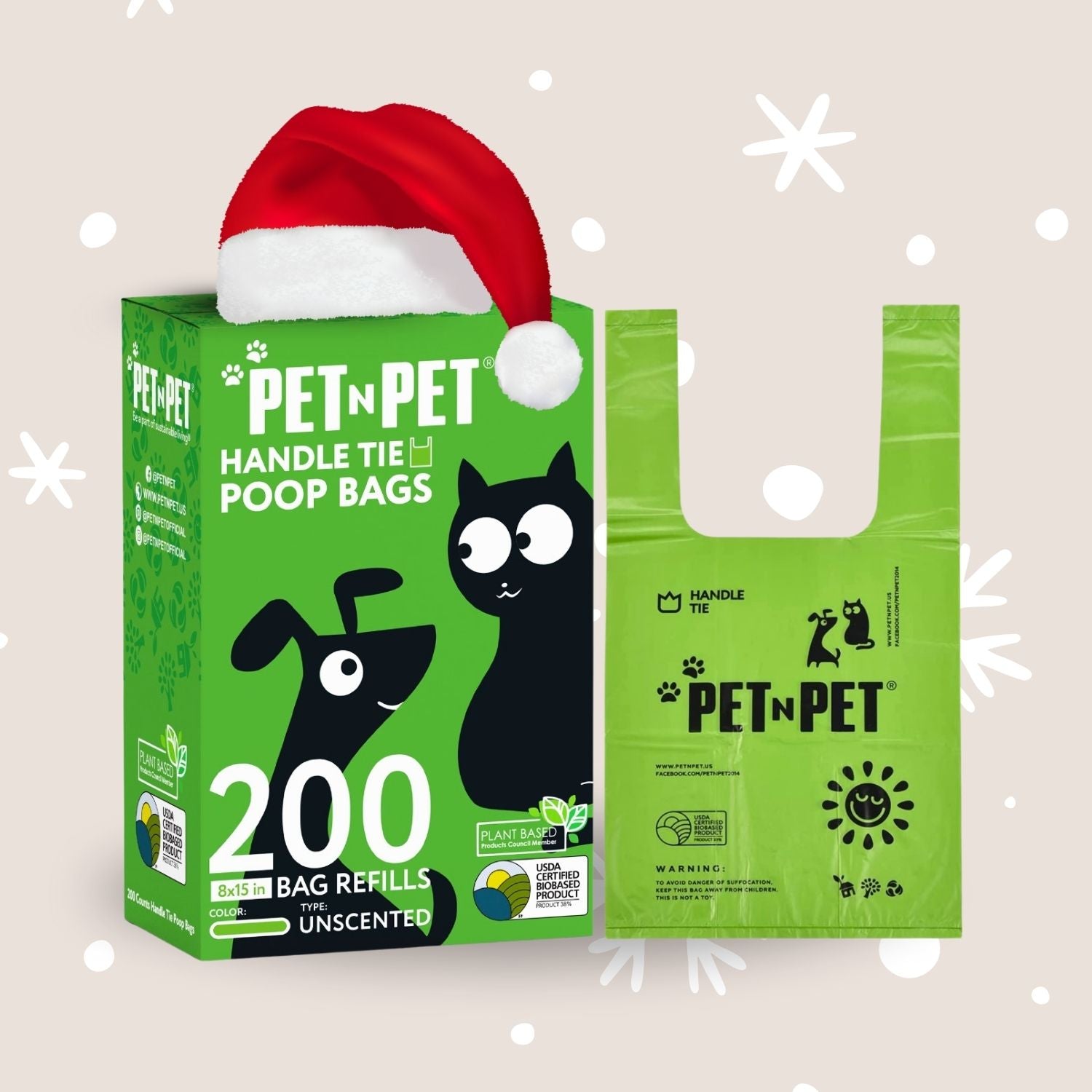 Green box of PET N PET handle tie poop bags with a Santa hat on a light beige background.