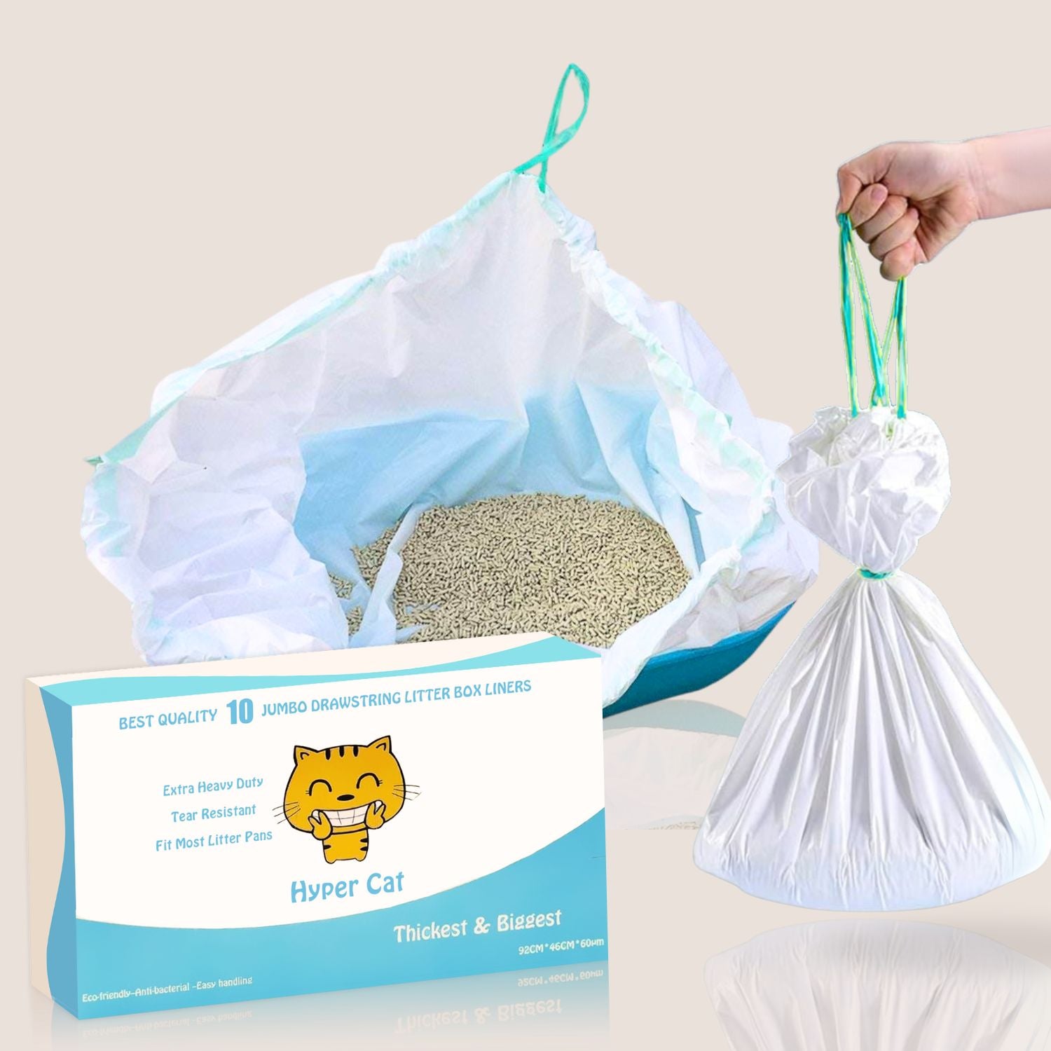 Cat litter bag with a hand holding it, showing the product and packaging on a neutral background.