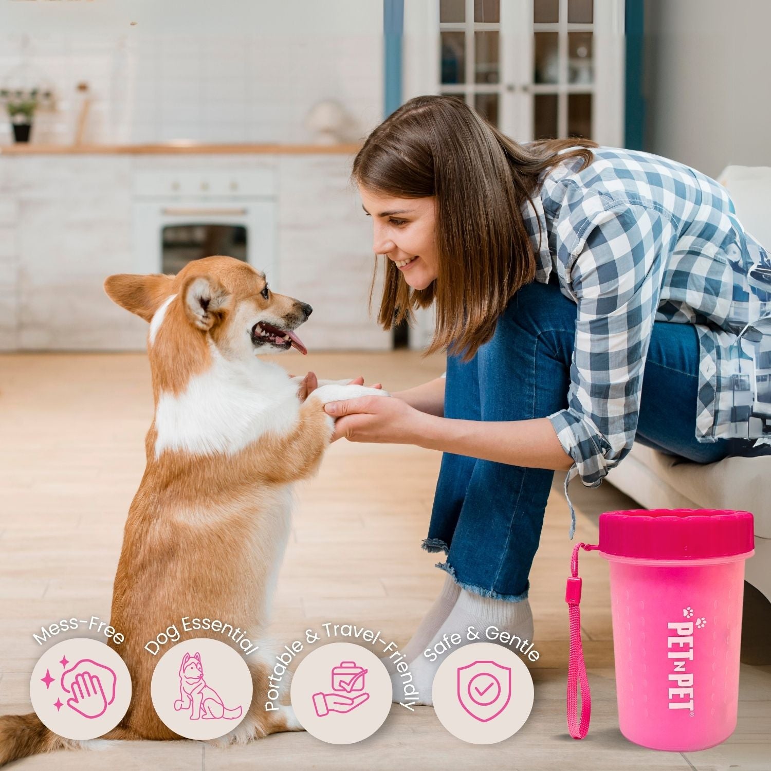 Woman and dog with a pink water bottle labeled 'PET N PET' in a home setting