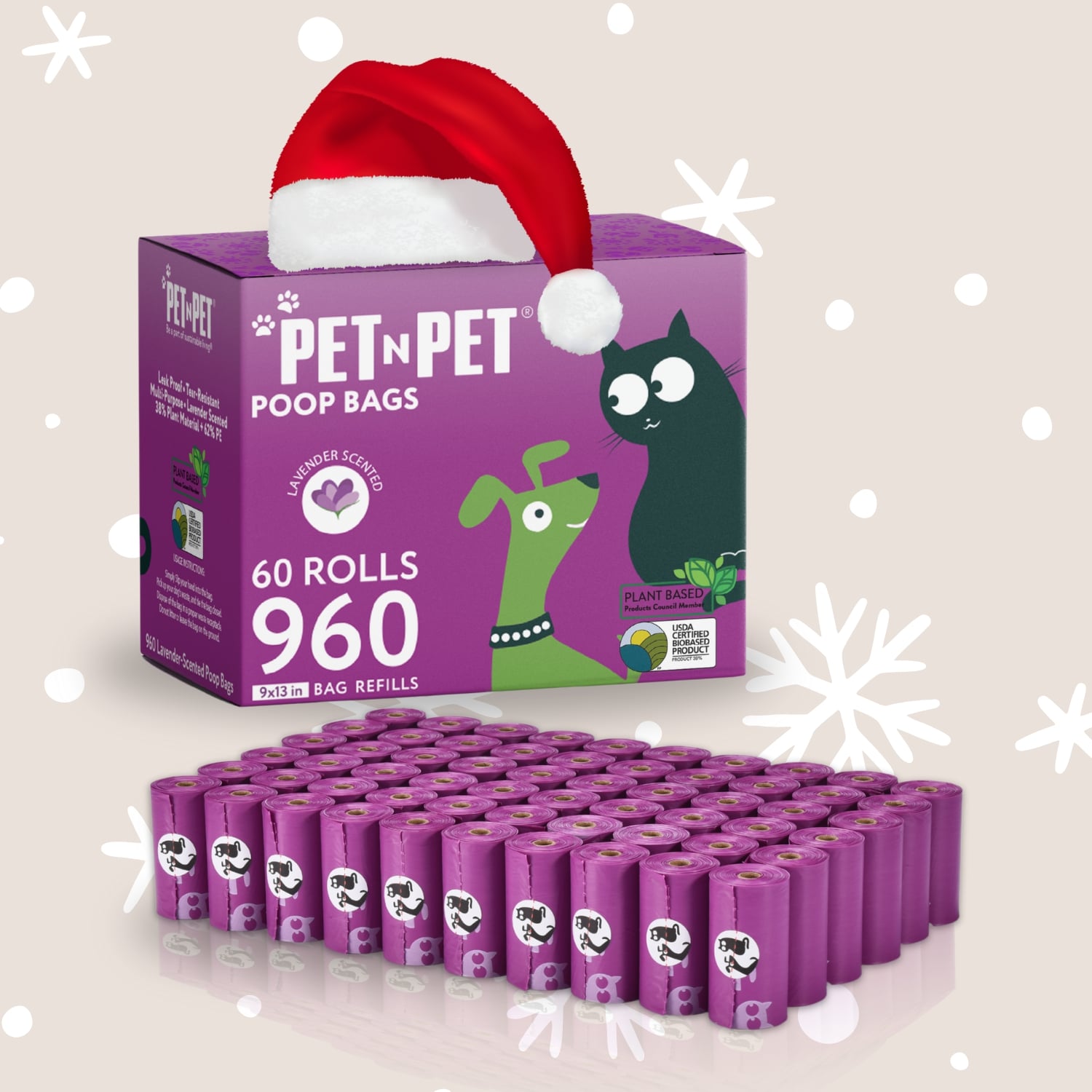 Box of Pet-N-Pet poop bags with a Santa hat on top, surrounded by rolls of bags.