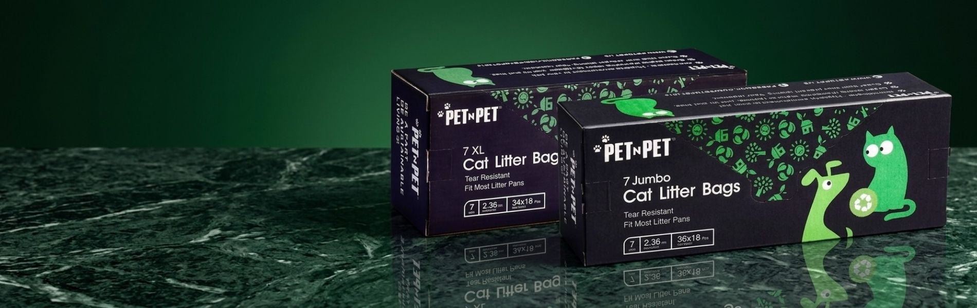 Three boxes of PETNPET cat litter bags on a dark surface with a green background