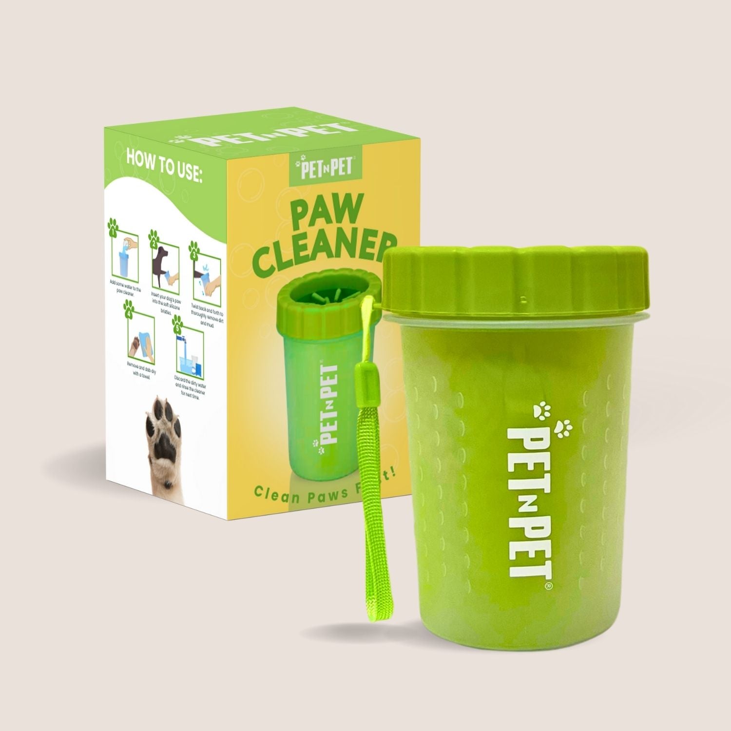 Green paw cleaner with packaging on a beige background