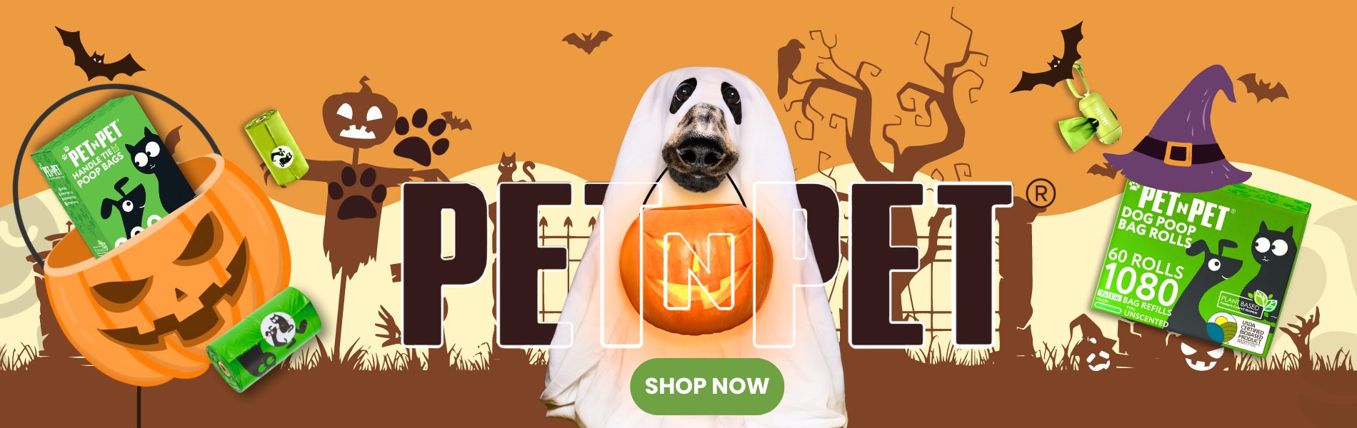 Halloween-themed Pet N Pet banner with a dog dressed as a ghost holding a pumpkin bucket. Poop bags are displayed around the image with cartoon bats, pumpkins, and trees in the background. Text reads ‘PET N PET’ and ‘Shop Now.